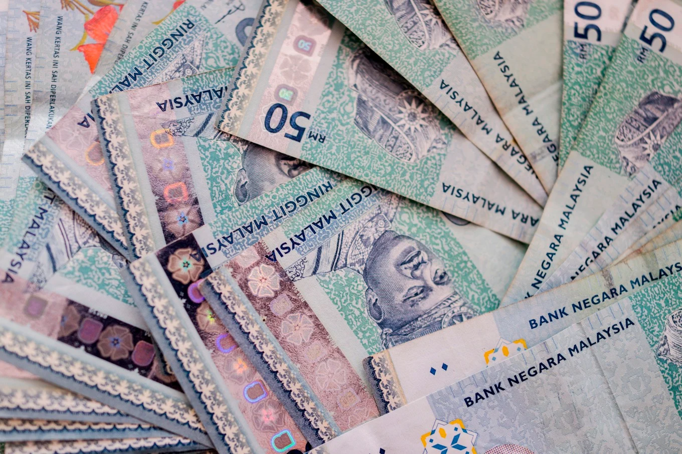 RM50 bertukar jadi RM50,000 sekelip mata, sekali Orang Gila Tampin Buat Lelaki Ni Jadi Kaya 2 ringgit malaysia 2 bloomberg